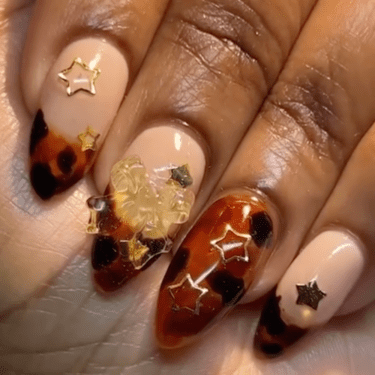 brown french nails with bows